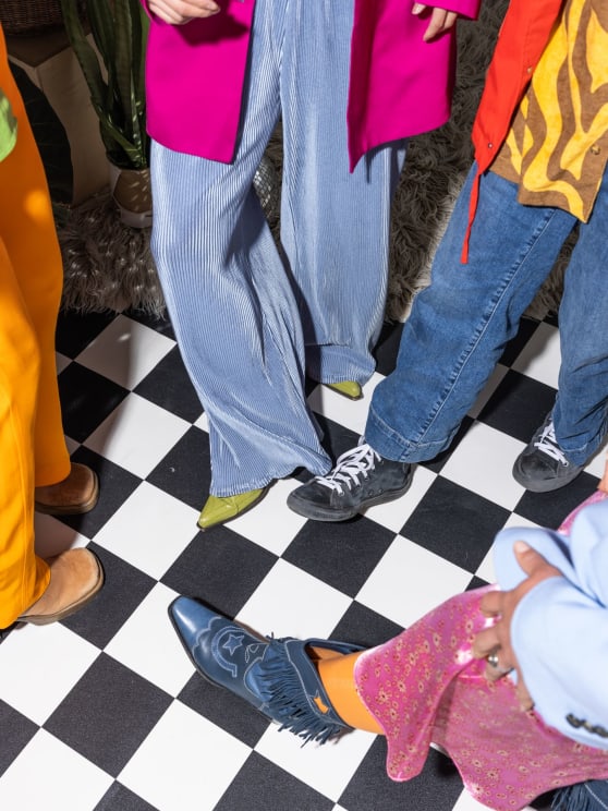 Several People Compare Their Footwear