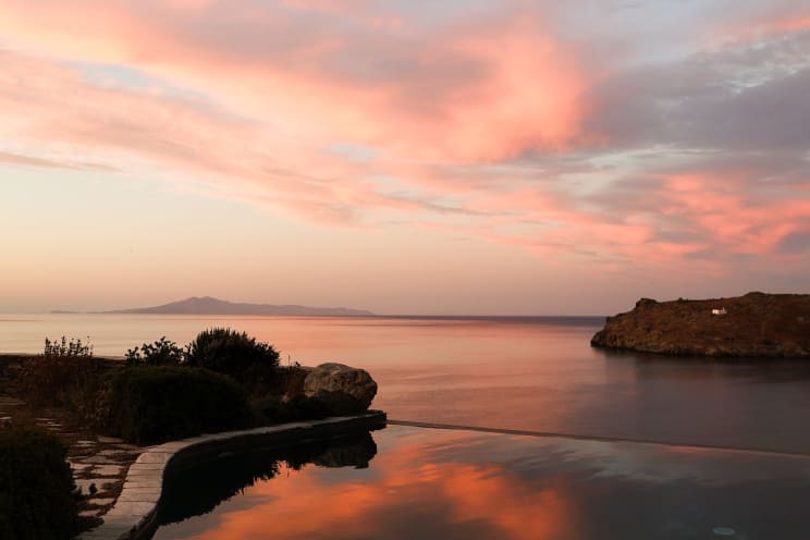 Landscape Of A Sea Against A Red Sky