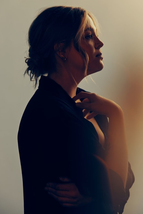 Woman Posing With An Emphasis On Her Hand Gesture
