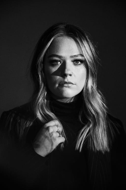 A Woman In A Black And White Room