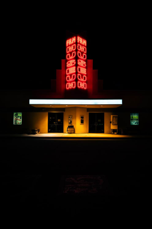 Exterior Of Film Museum With Neon Sign