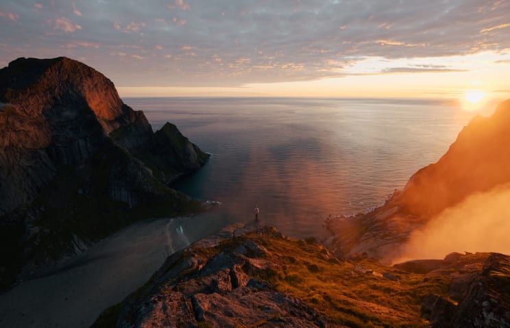 A Serene Landscape Of Mountains And Water