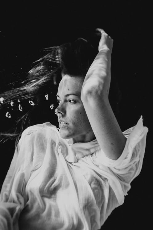 A Woman Relaxes Underwater