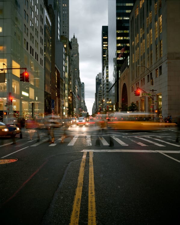 Urban City Landscape With Heavy Traffic And Modern Skyscrapers