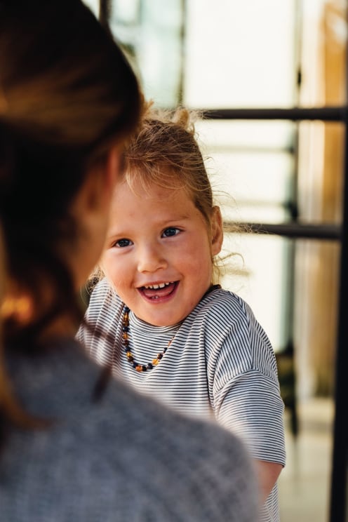 Two People A Female Adult And A Child Are Having Fun And Being Carefree