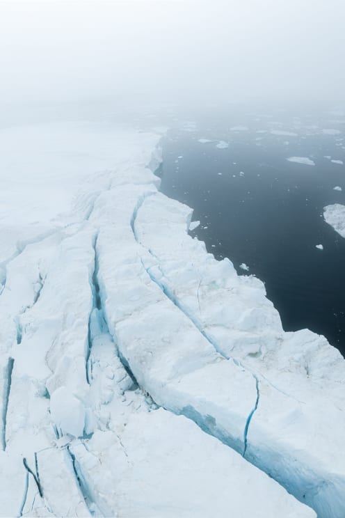 Arctic Ice Crevice And Water
