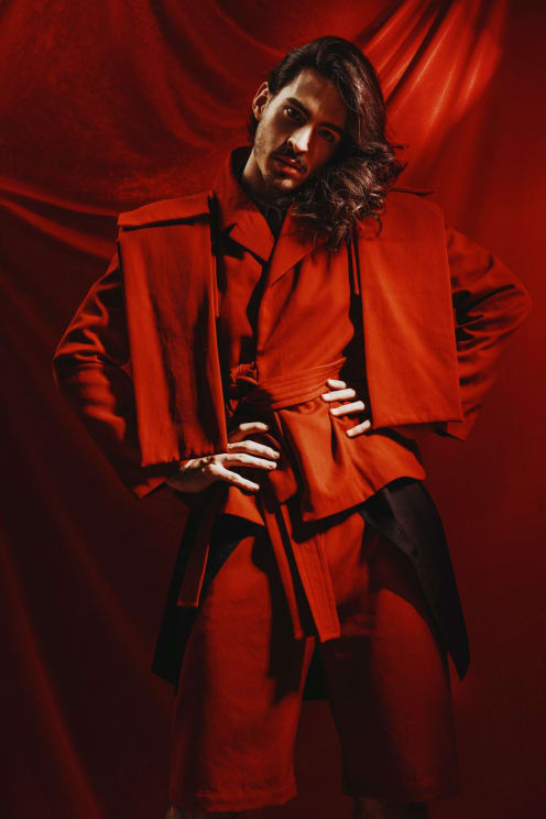 Model With Long Hair Wearing Red Garments
