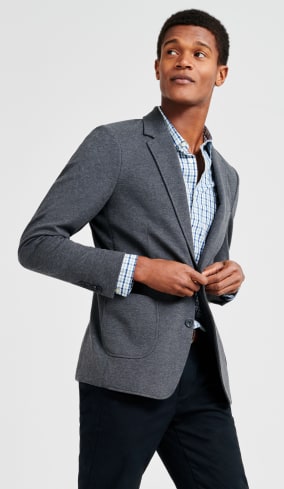 Grey blazer, check shirt and smart dark trousers