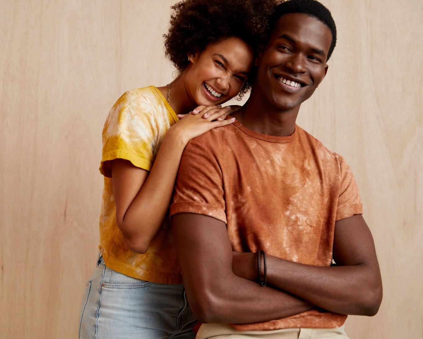 Stitch Fix Mohnton Made Earth Day models wearing cloud wash tees in fustic yellow and cutch brown.