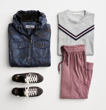 Activewear outfit including a blue windbreaker jacket, white striped tee, sneakers and pink jogger pants.