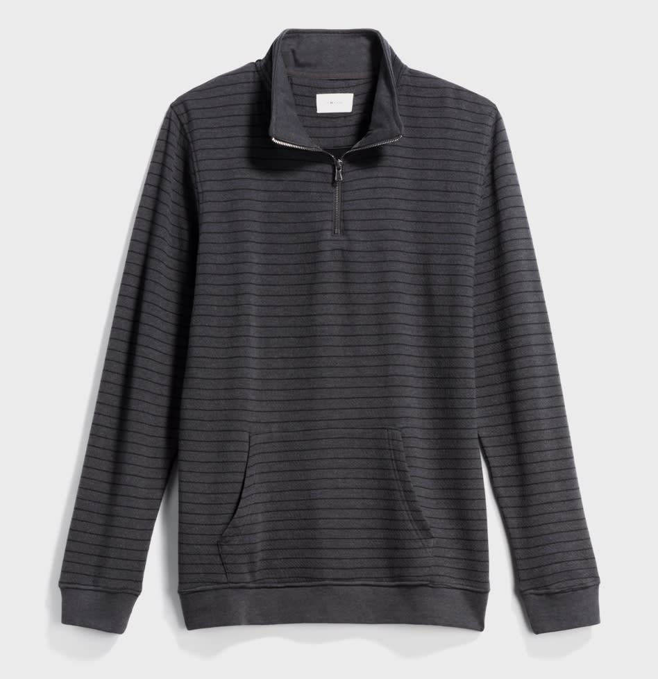 Grey and black striped half-zip shirt with kangaroo pocket.