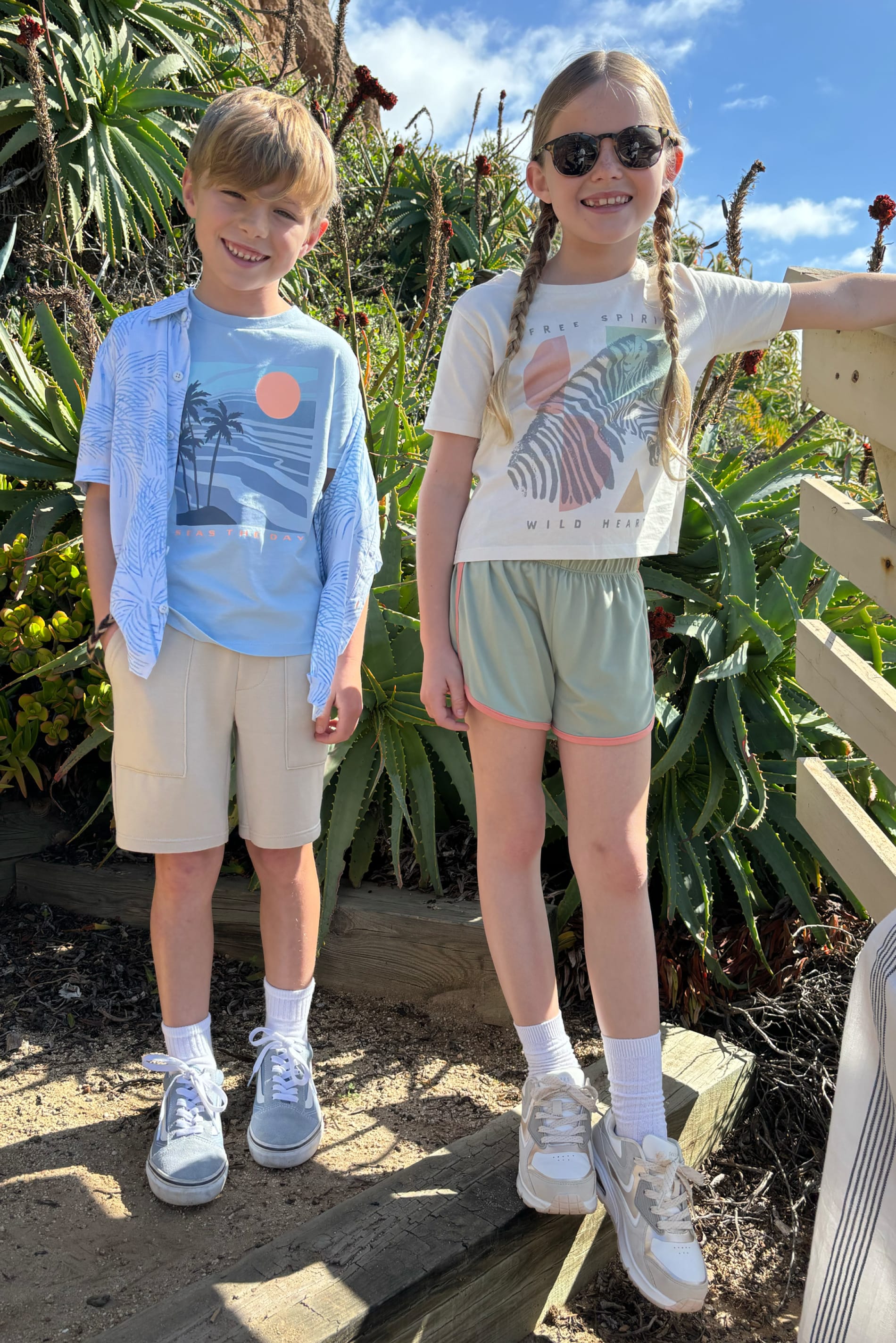 Kids: Kids wearing Stitch Fix shorts and graphic T-shirts
