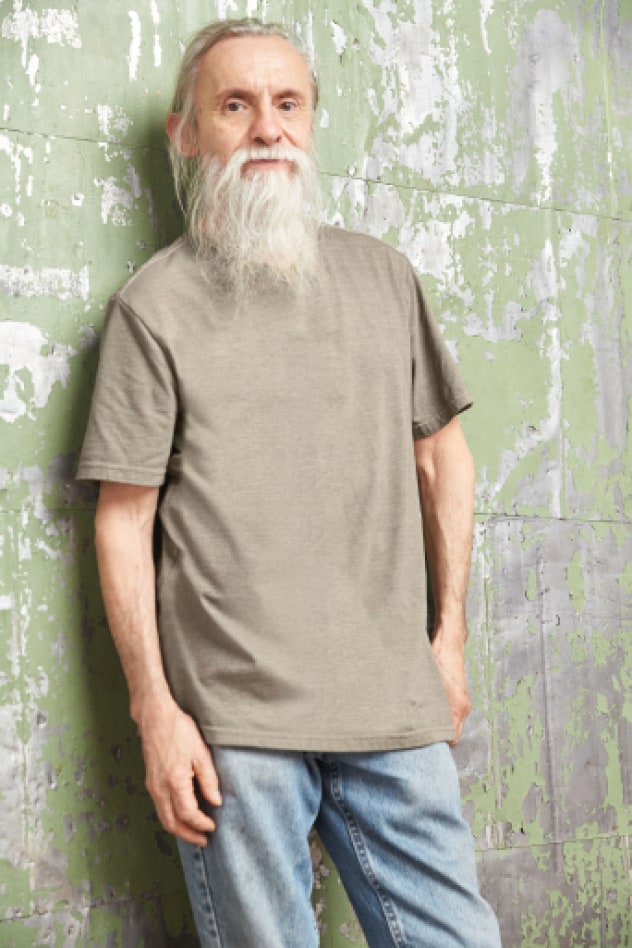 Man wearing Stitch Fix Mohnton Made green t-shirt