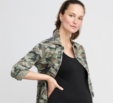 Black maternity workout top with camo jacket.