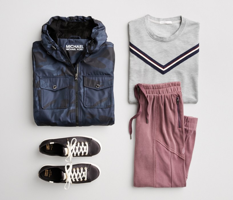 Activewear outfit including a blue windbreaker jacket, white striped tee, sneakers and pink jogger pants.