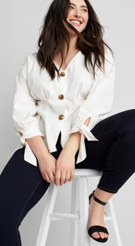 White button shirt with black pants and black shoes.