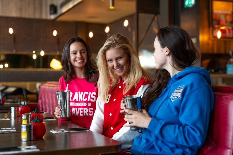 Models wear (from left to right) our College Sweatshirt, our Varsity Jacket and our College Hoodie