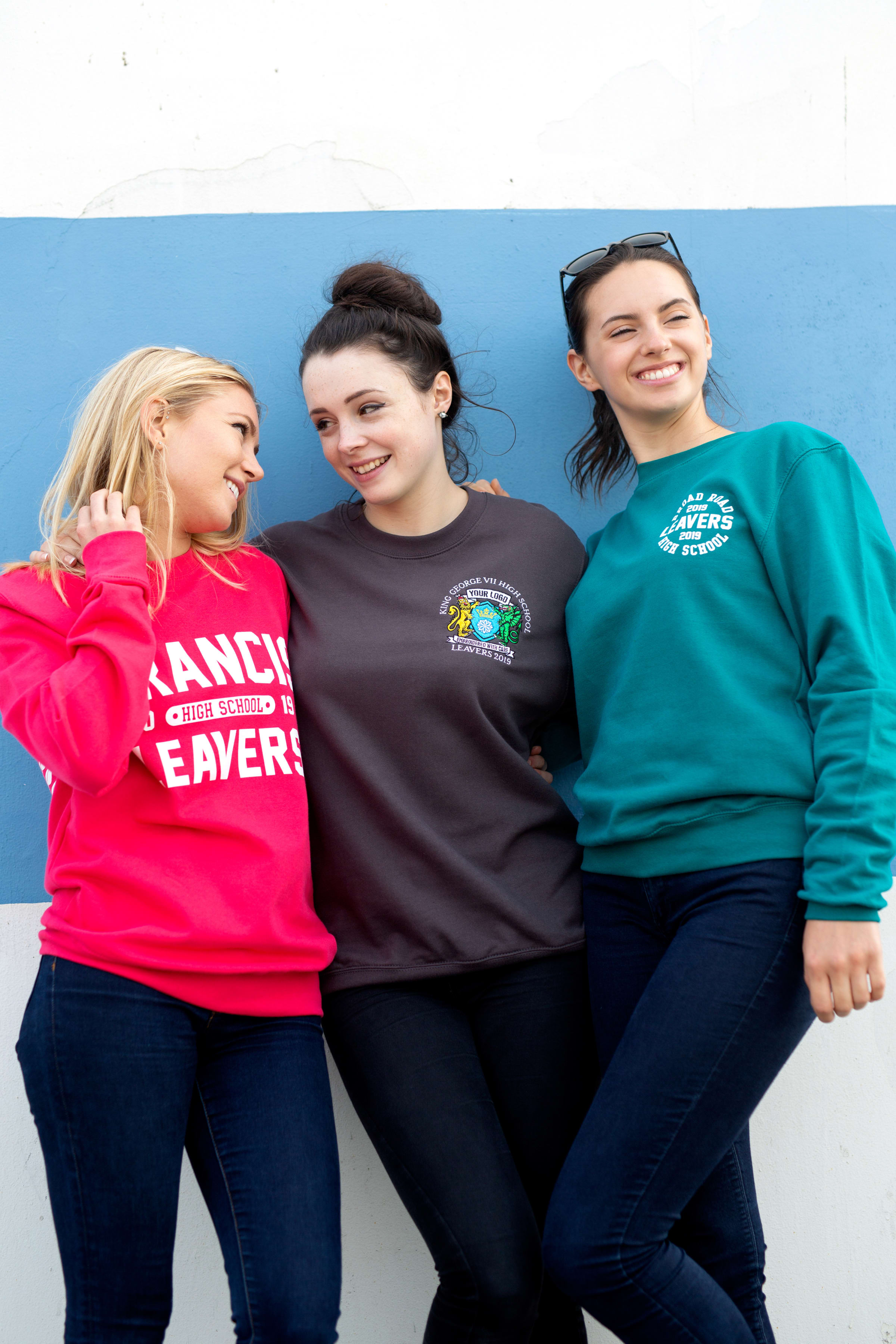 Models wear our College Sweatshirts in lipstick pink, steel grey and jade colour