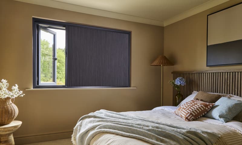 Arena Blind Screen with Duette Elan Silk Charcoal blackout in a bedroom