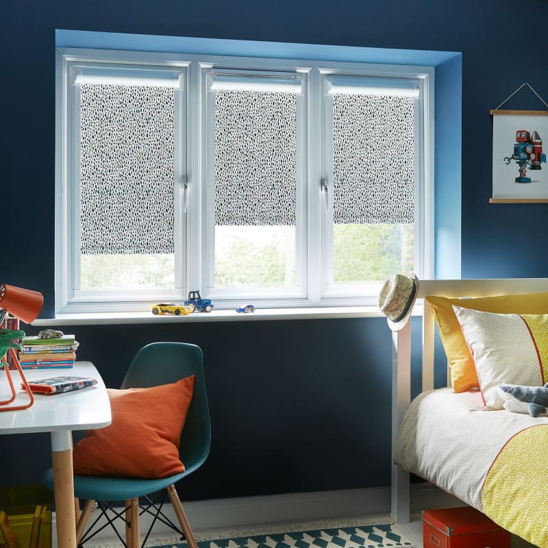 Arena Perfect Fit Lenny Navy roller blinds in a child's bedroom
