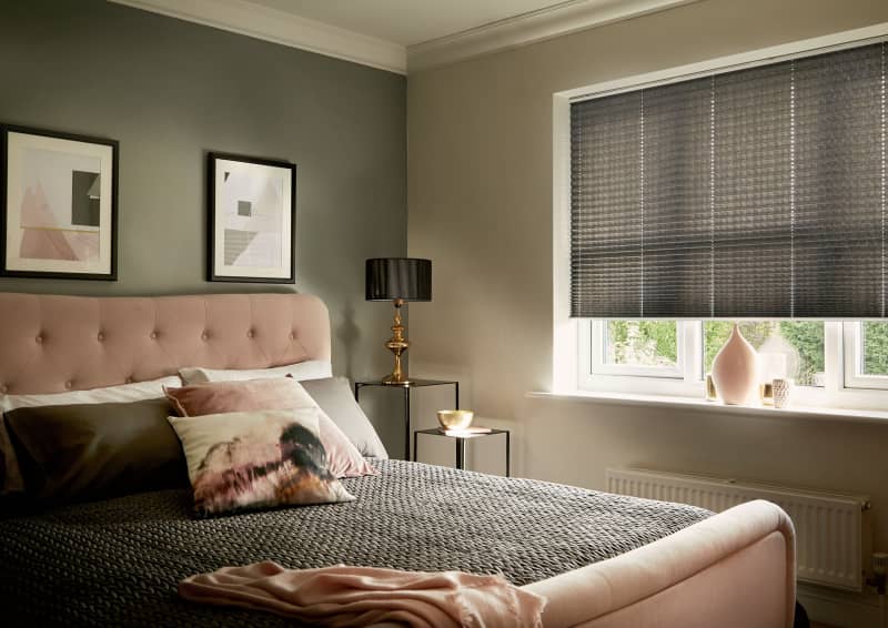 Arena charcoal pleated blind in a bedroom