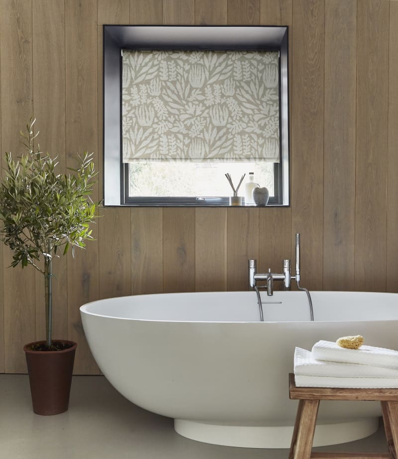 Arena Ocean Taupe roller blind in a bathroom