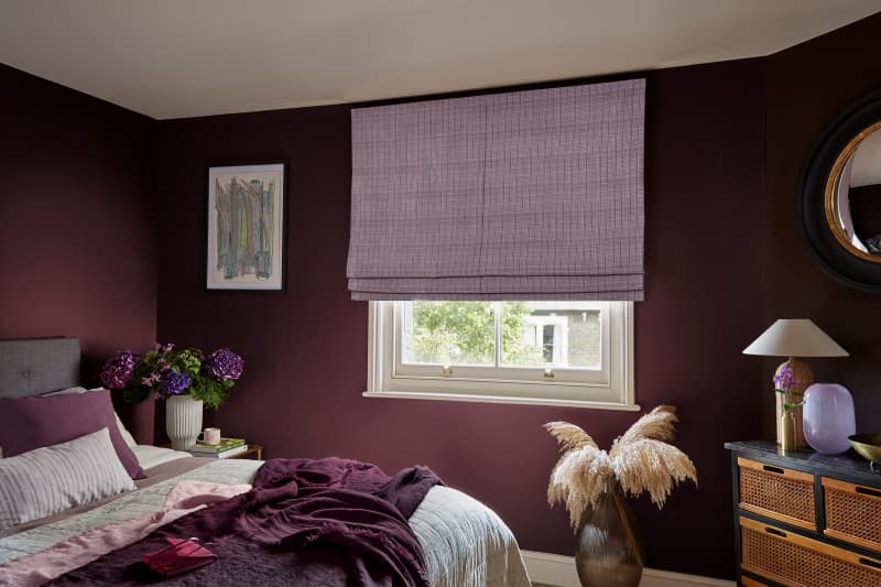 Arena Medina Iris Roman blind in a bedroom