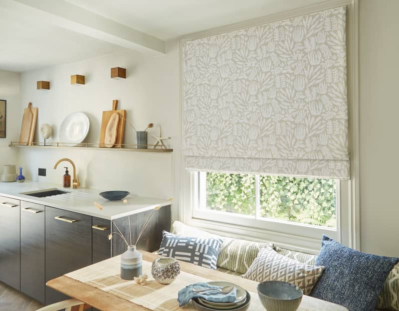 Arena Ocean Natural Roman blind in a kitchen diner
