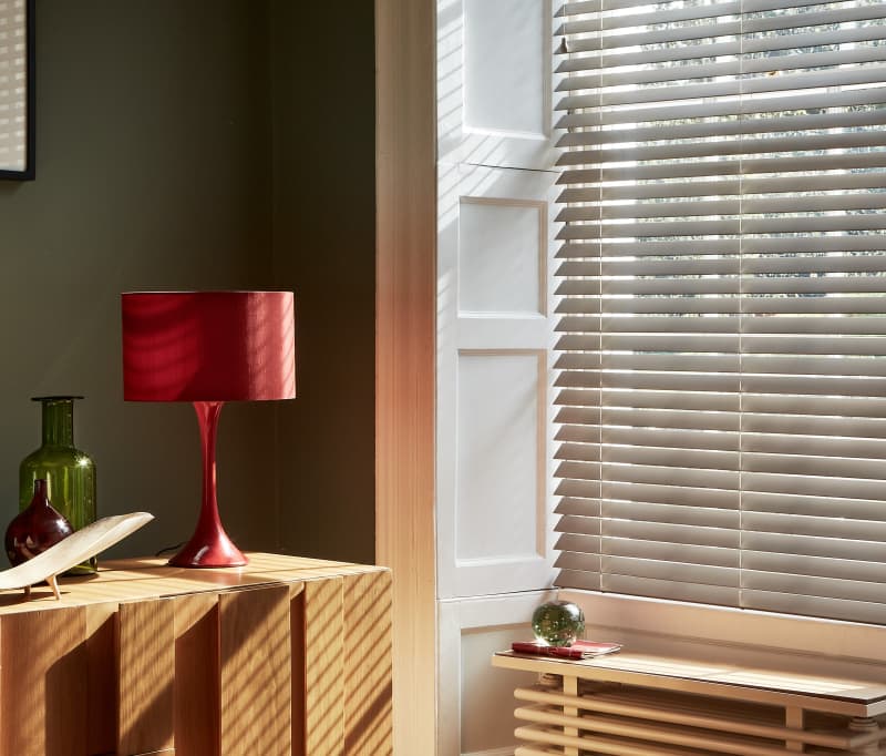 Arena Sylvan Stone Grey wooden Venetian blind in a living room
