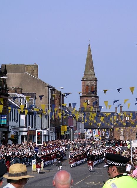Riding of the Marches parade with pipe bands on Annan High Street