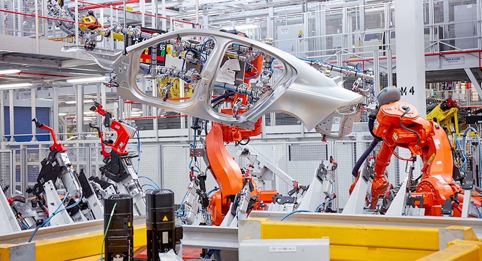 Jaguar XE being built by manufacturing robots at Jaguar Castle Bromwich