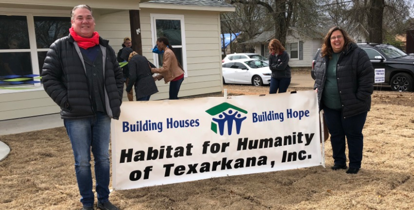 A Habitat for Humanity ribbon-cutting ceremony in Texarkana, TX.