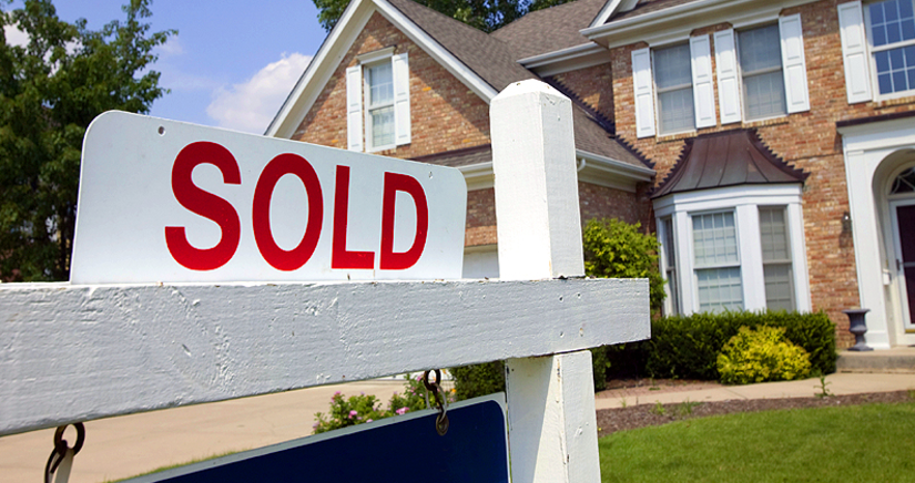 Sold Sign on Residential Building
