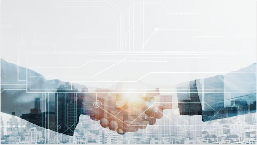 business men shaking hands with blue color behind them