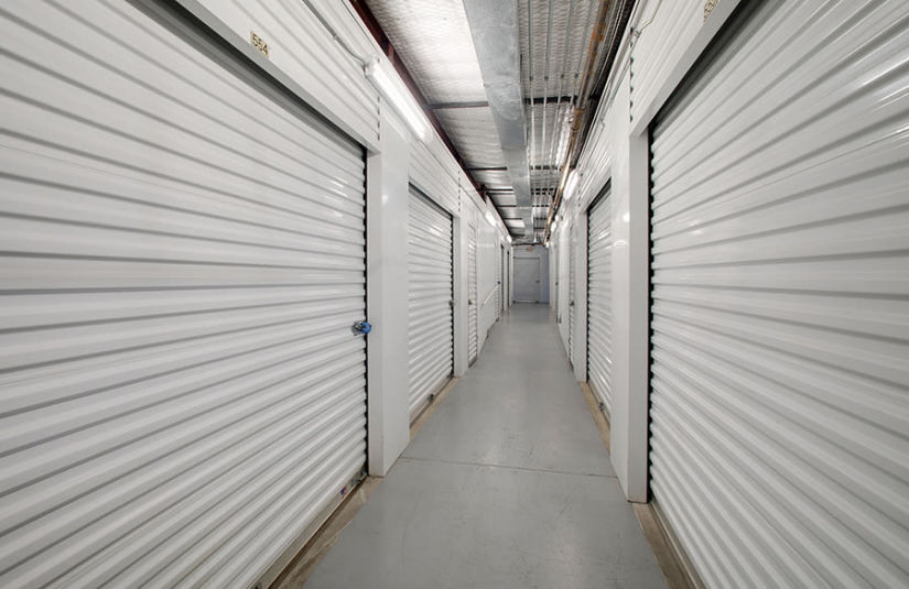 An interior hallway lined with large storage units.