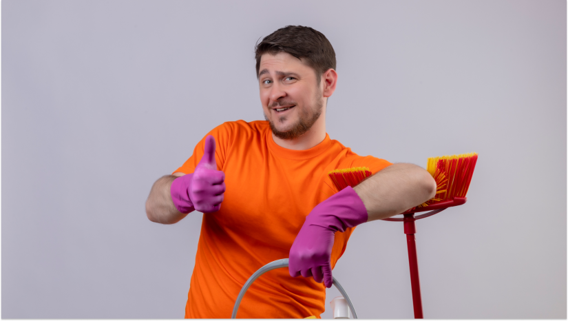 man thumbs up with gloves and cleaning supplies