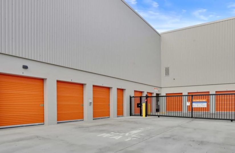 Self storage units with orange doors at A-1 Self Storage San Jose business facility