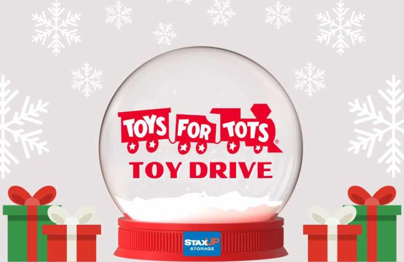 Snow Globe Graphic with Toys for Tots logo and StaxUP Storage Logo with Snow Flakes and Presents