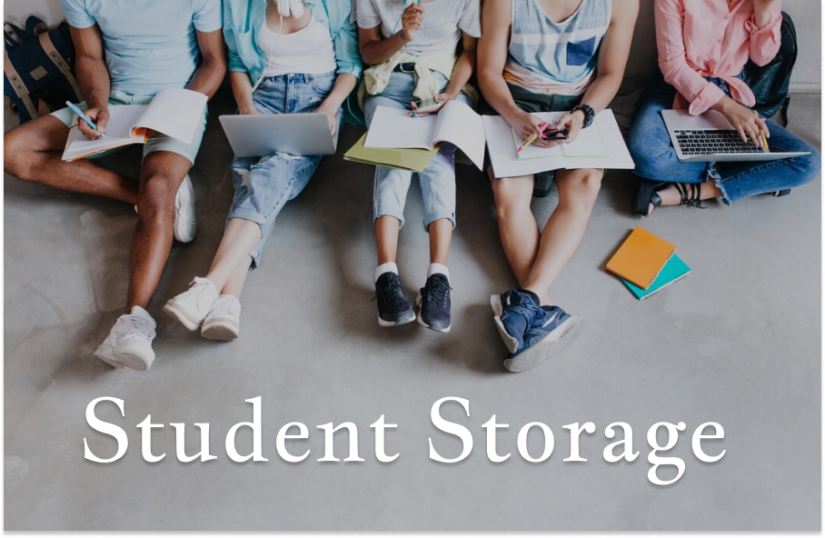 students sitting with notebooks and laptops