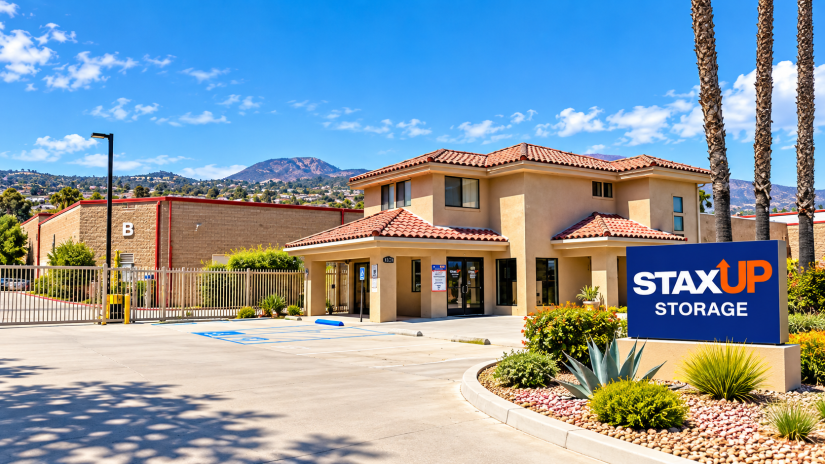 StaxUP Storage San Marcos facility entrance with branded sign and gated storage access.