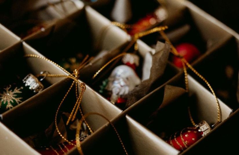 A box of holiday ornaments.