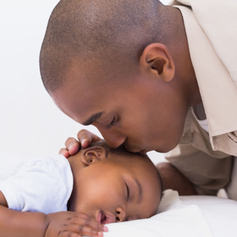 a young father with his baby