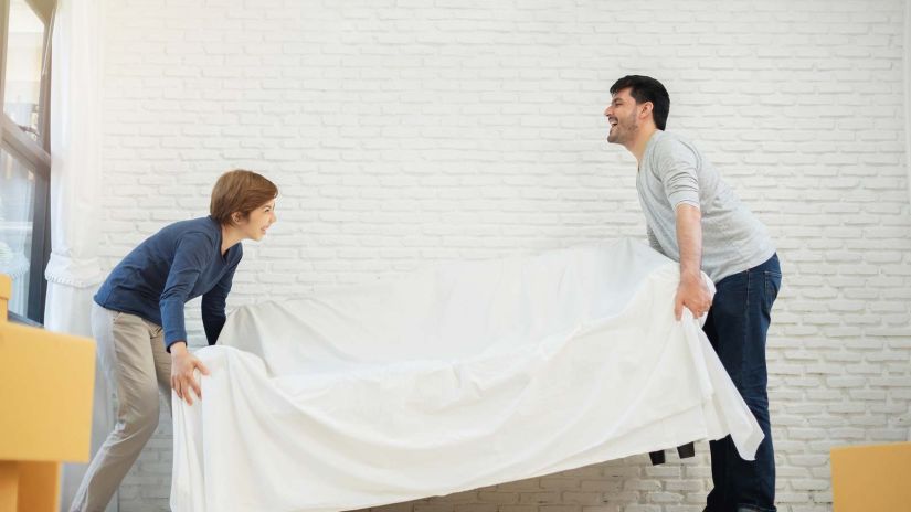 choosing the right storage unit size with boxes and furniture organized in self storage unit