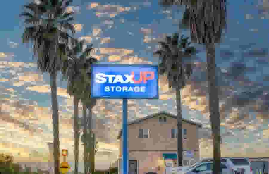 The front of the StaxUP Storage - Homeland property at sunset.