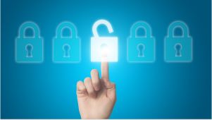 finger pressing a digital white lock with blue locks on a blue background