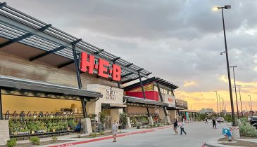 H-E-B Store Front with Orange Sunset Background