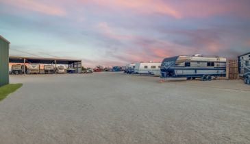 Cotton Candy Sky with Open and Covered parking with RV parked