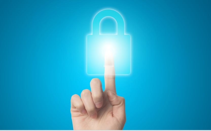 finger on a graphic lock with a blue hue with a darker blue behind it
