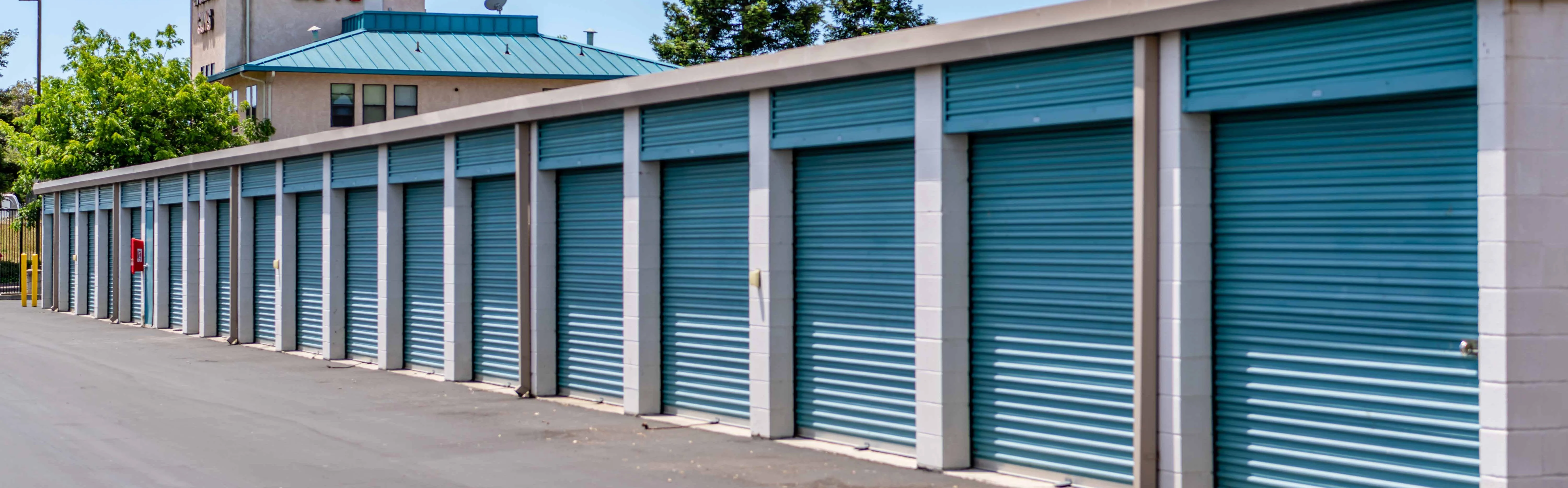 Image of Drive-Up Storage Units and sign for Storage Guys in Fairfield CA