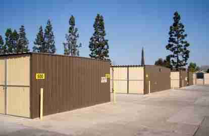 THis image shows rows of storage units lined up in an outdoor setting